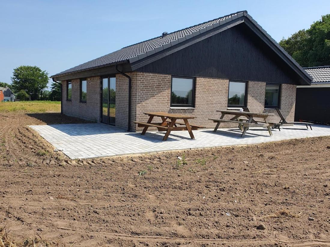 Faelleshuset Kirkebakken Bed & Breakfast Otterup Bagian luar foto