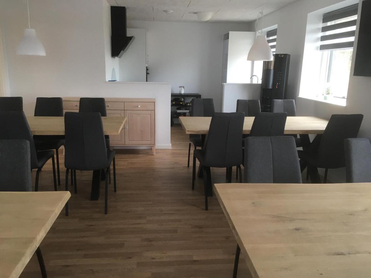 Faelleshuset Kirkebakken Bed & Breakfast Otterup Bagian luar foto